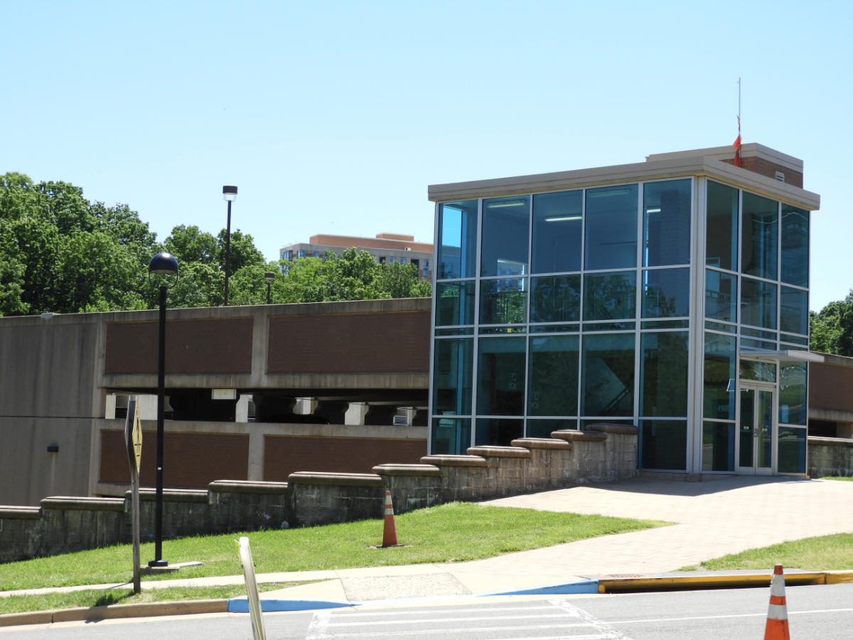 Beauregard Street parking garage with glass stair tower after concrete restoration
