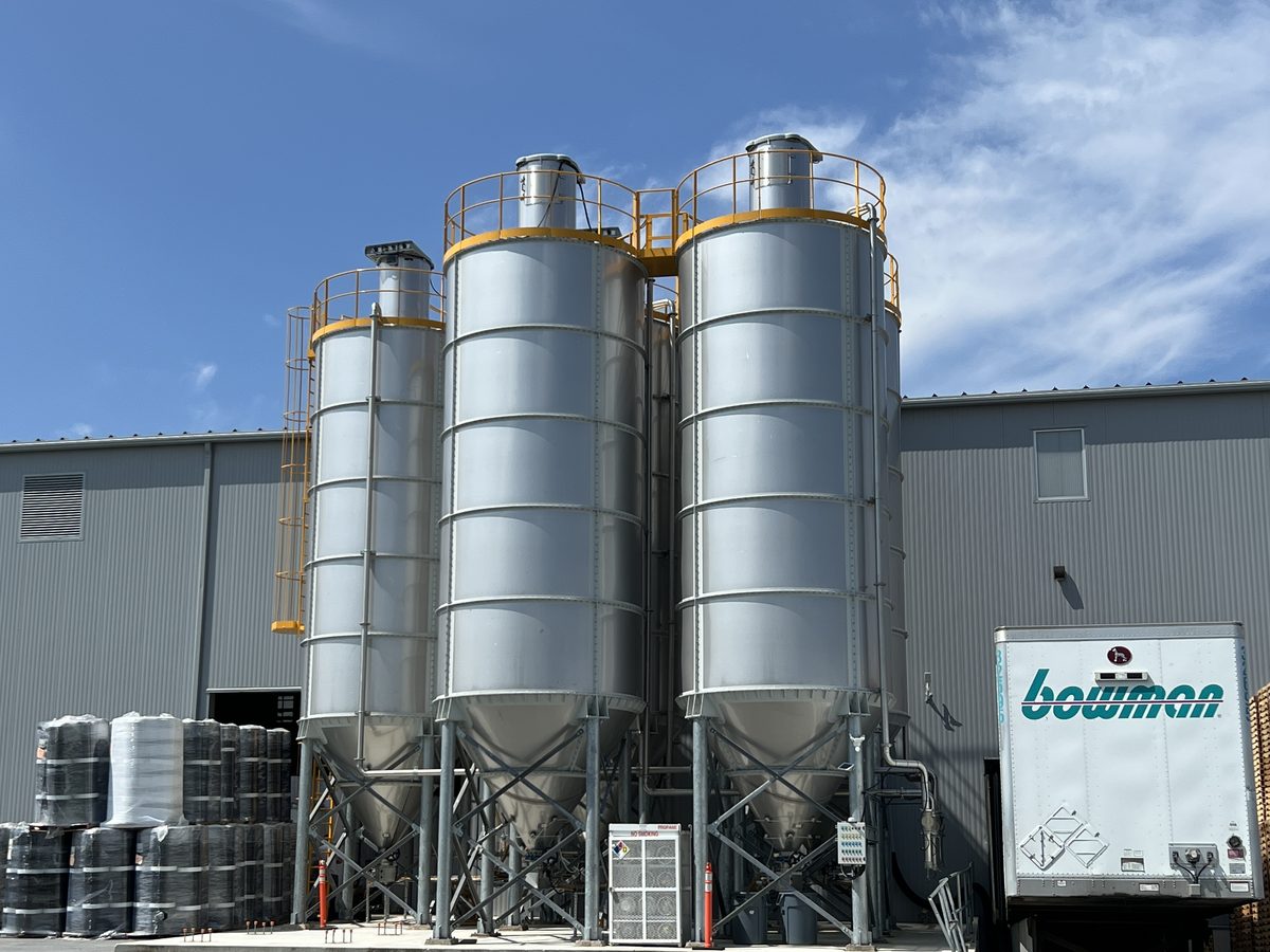 Three 65 ton bulk storage silos on steel supports and new foundations at the TeMa USA plant